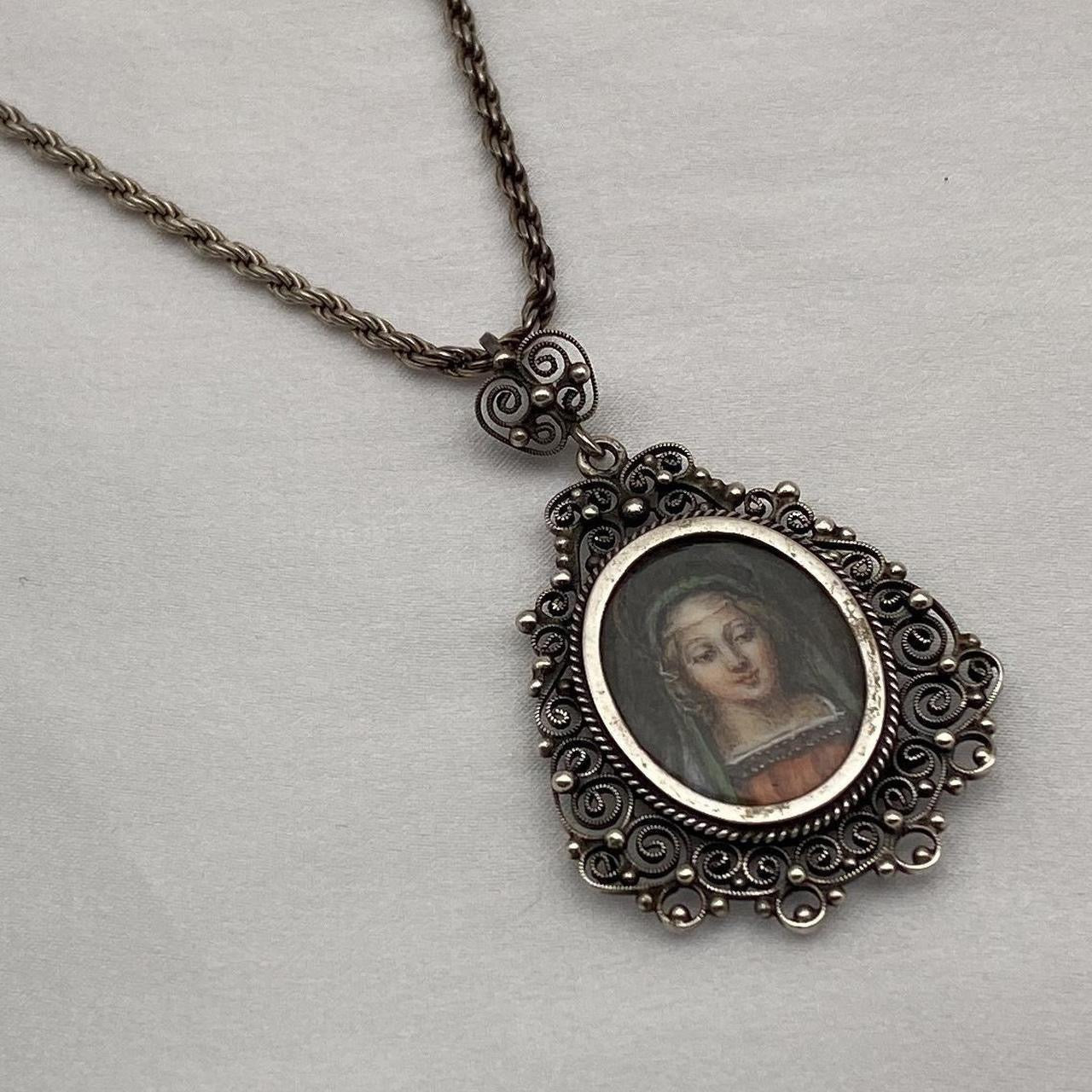 Antique victorian filigree virgin Mary pendant