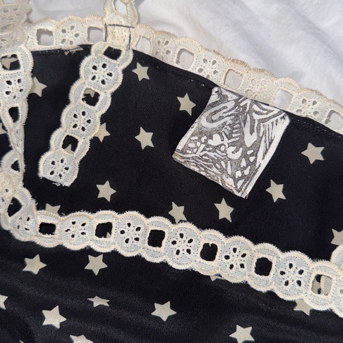 100% silk & lace crop top in black & white star