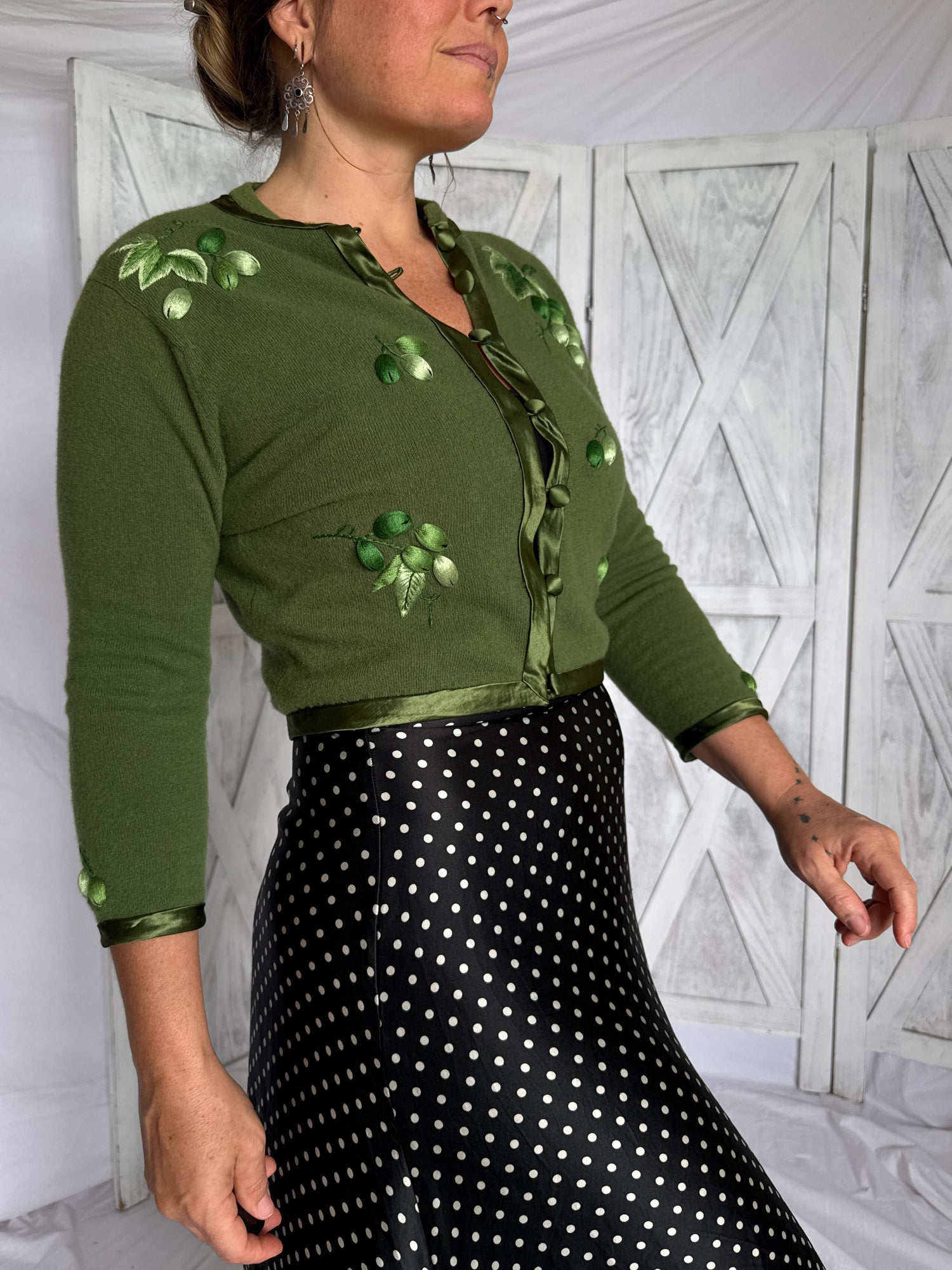 Vintage 1950s green embroidered wool cardigan front view
